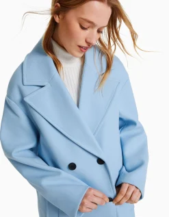 BERSHKA Abrigo largo hombro caído Crudo Discount