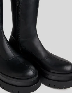 BERSHKA Botas planas XL suela track Negro Outlet