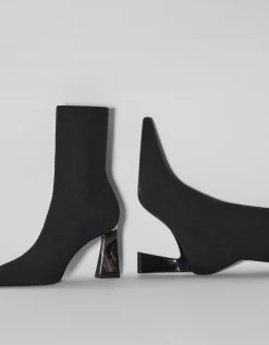 BERSHKA Botines ajustados tacón cromado Negro Online