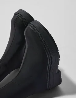 BERSHKA Botines planos ajustados Negro Flash Sale