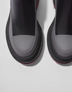 BERSHKA Botines planos suela color Combinado Shop