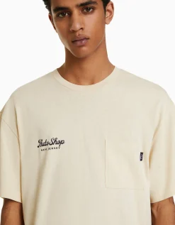 BERSHKA Camiseta manga corta boxy fit print Camel New