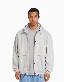 BERSHKA Cazadora capucha denim parachute Gris New