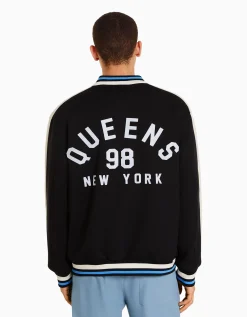 BERSHKA Cazadora efecto ante parche Negro Store