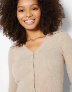 BERSHKA Cárdigan cuello polo botones Arena Best