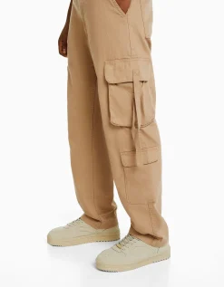 BERSHKA Jeans cargo cintas Camel Store