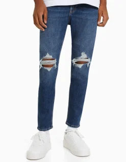 BERSHKA Jeans carrot rotos Azul Online