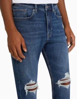 BERSHKA Jeans carrot rotos Azul Online