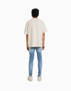 BERSHKA Jeans skinny rotos pintura Azul lavado Best Sale