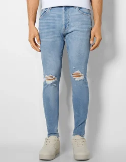 BERSHKA Jeans super skinny rotos Azul Discount