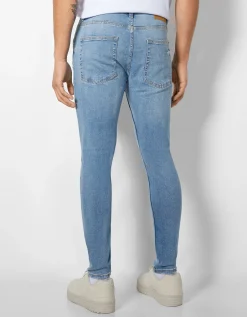 BERSHKA Jeans super skinny rotos Azul Discount