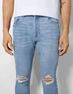 BERSHKA Jeans super skinny rotos Azul Discount