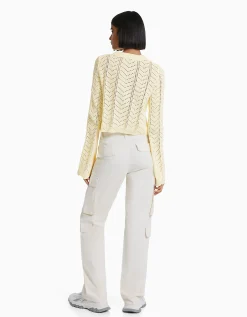 BERSHKA Jersey cuello redondo calados Amarillo Store