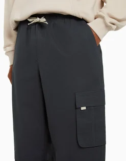 BERSHKA Pantalón cargo parachute algodón Kaki Fashion