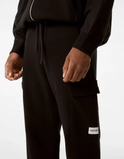 BERSHKA Pantalón felpa jogger cargo Negro Shop