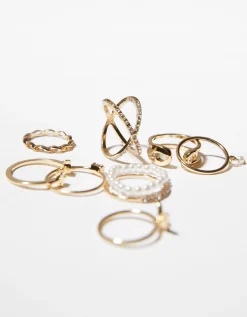 BERSHKA Set 9 anillos cruz mariposa Oro Shop