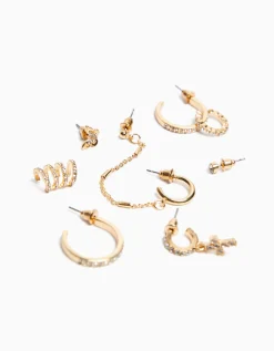 BERSHKA Set 8 pendientes aros ear cuff pedrería cruz Oro Outlet