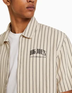 BERSHKA Sobrecamisa manga corta canvas cremallera Crudo Outlet