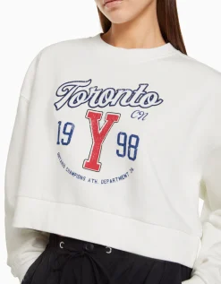 BERSHKA Sudadera cropped print Blanco roto Outlet