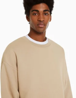 BERSHKA Sudadera cuello redondo oversize Negro Store