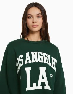 BERSHKA Sudadera oversize print Azul claro Outlet
