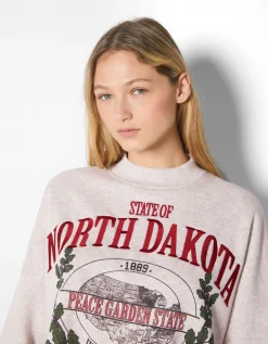 BERSHKA Sudadera print bordado Arena Outlet