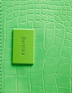BERSHKA Tarjetero placa grabado estampado animal Azul claro Outlet